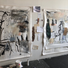 Two paintings with lots of collage and mixed media in progress